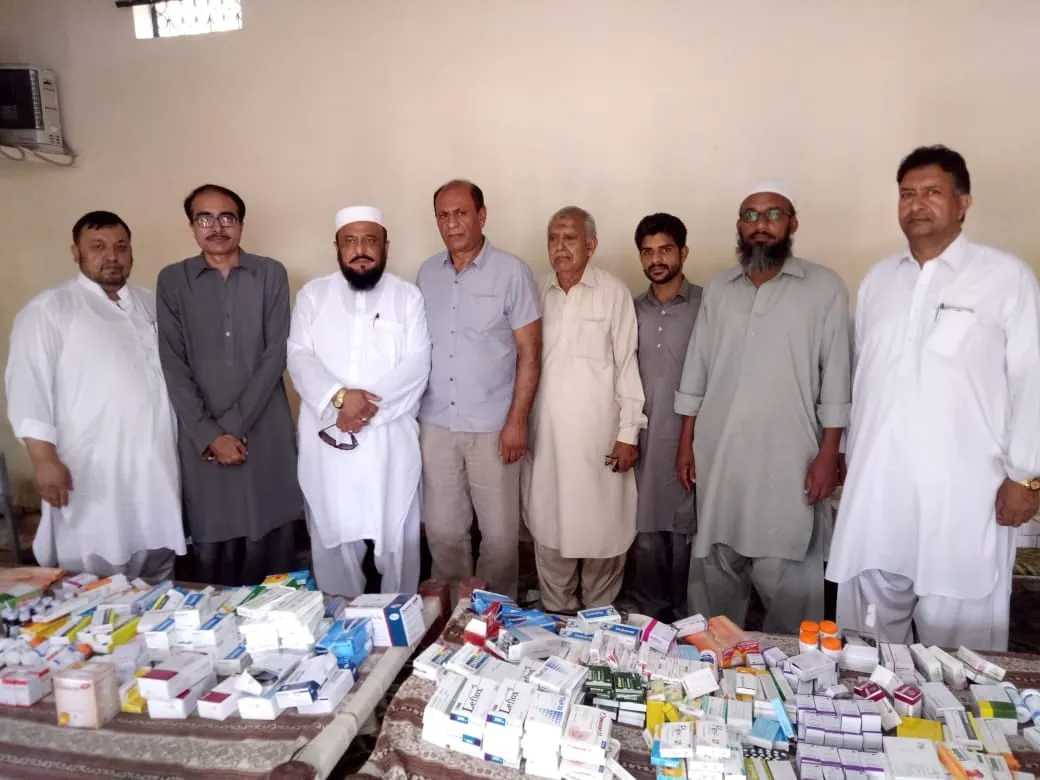 Al-Ain trustees and supporters with donated medicines at the Bhatti Clinic